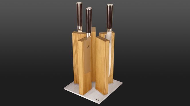 
                    The magnetic knife block accommodates up to 10 knives