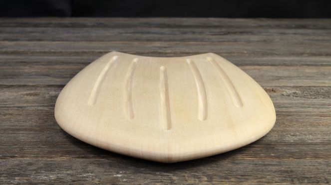 
                    The bread cutting board is made of maple wood