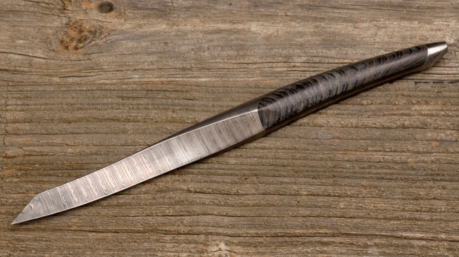 
                    swiss damask knife set with typical damask pattern