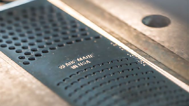
                    Microplane fine grater with photo-etched blade