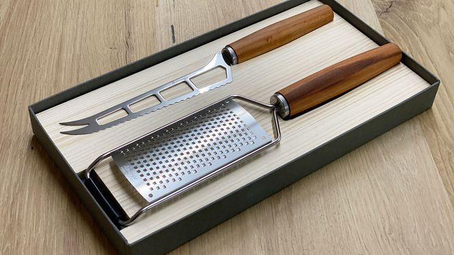 
                    Cheese set with cheese knife and cheese grater
